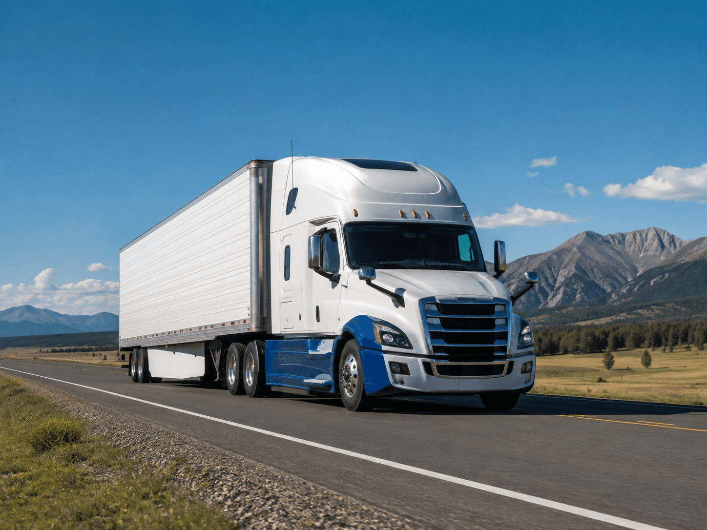 Commercial truck fleet parked at a logistics facility
